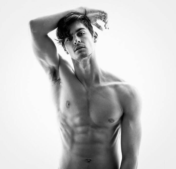 Karl Kugelmann flaunting his body.